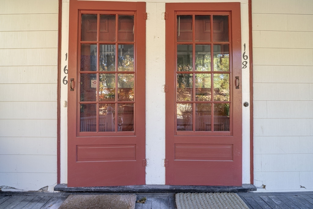 168 Elliot Street, Unit 1 Newton, MA 02464 - Photo 12 of 14 a view of front door