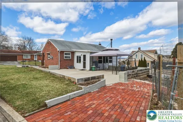 a front view of house with yard