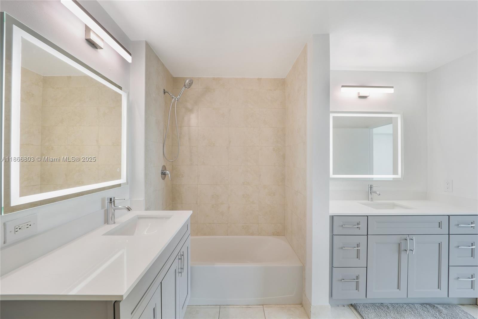 1900 North Bayshore Drive, Unit 4112 Miami, FL 33132 - Photo 15 of 20 a bathroom with a tub sink and mirror