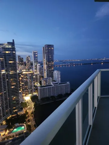 a view of balcony with furniture