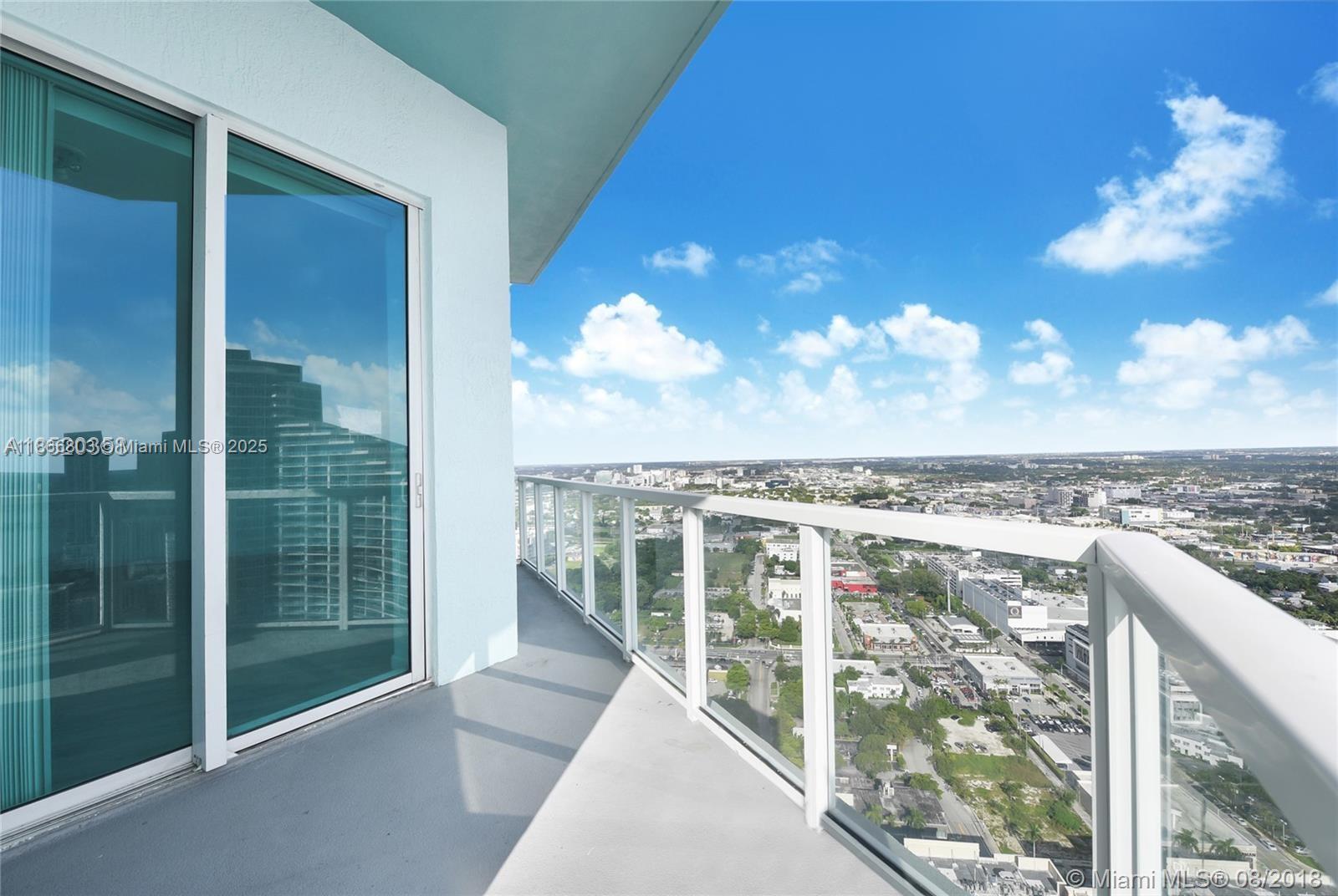 1900 North Bayshore Drive, Unit 4112 Miami, FL 33132 - Photo 6 of 20 a view of a balcony with yard