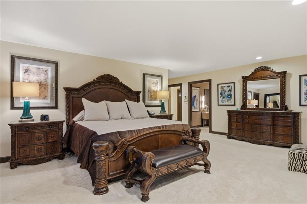 514 Justabout Road Venetia, PA 15367 - Photo 31 of 50 a bedroom with a bed a dresser and mirror