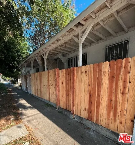 a view of a wooden fence