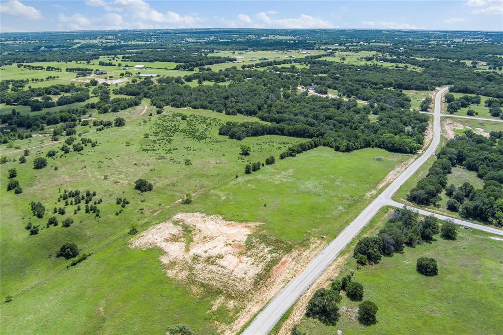 316 Kilkenny Road Poolville, TX 76487 - Photo 13 of 20 a view of a lush green field