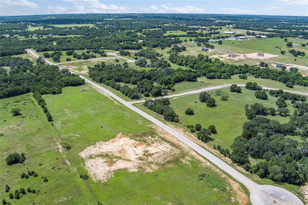 316 Kilkenny Road Poolville, TX 76487 - Photo 14 of 20 a view of a lake with a yard