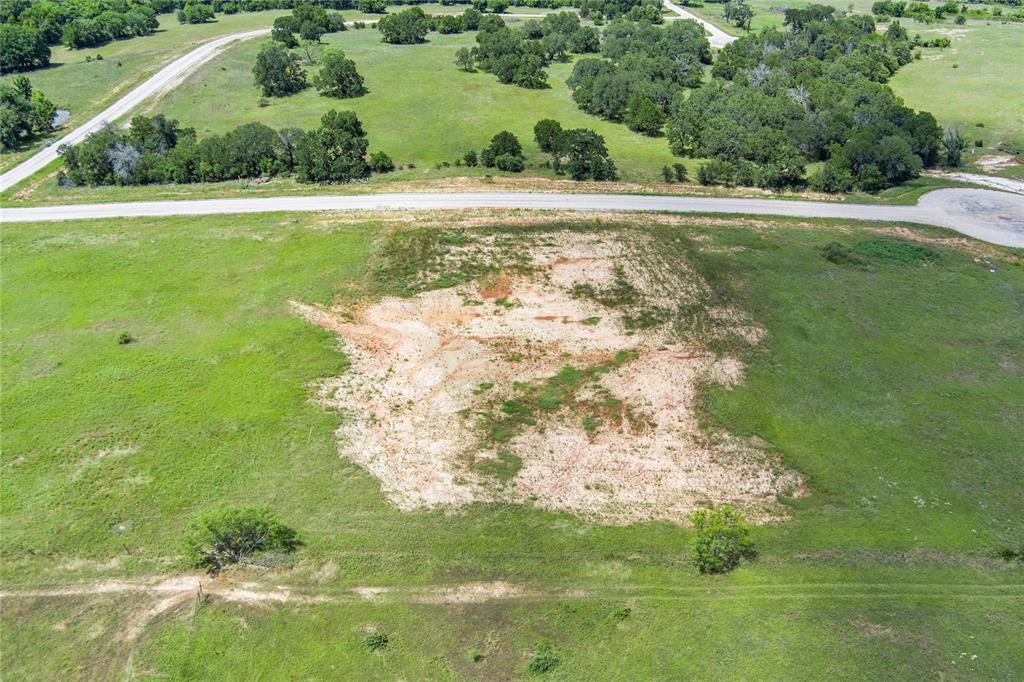 316 Kilkenny Road Poolville, TX 76487 - Photo 7 of 20 a view of a garden with a lake