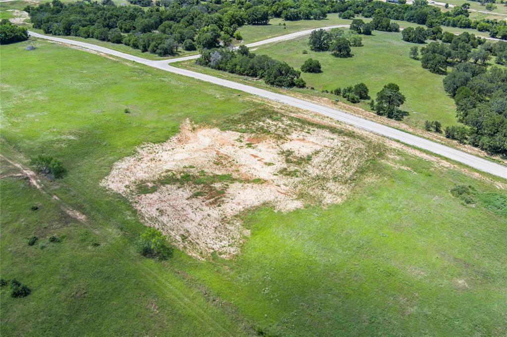 316 Kilkenny Road Poolville, TX 76487 - Photo 9 of 20 a view of a garden with a lake