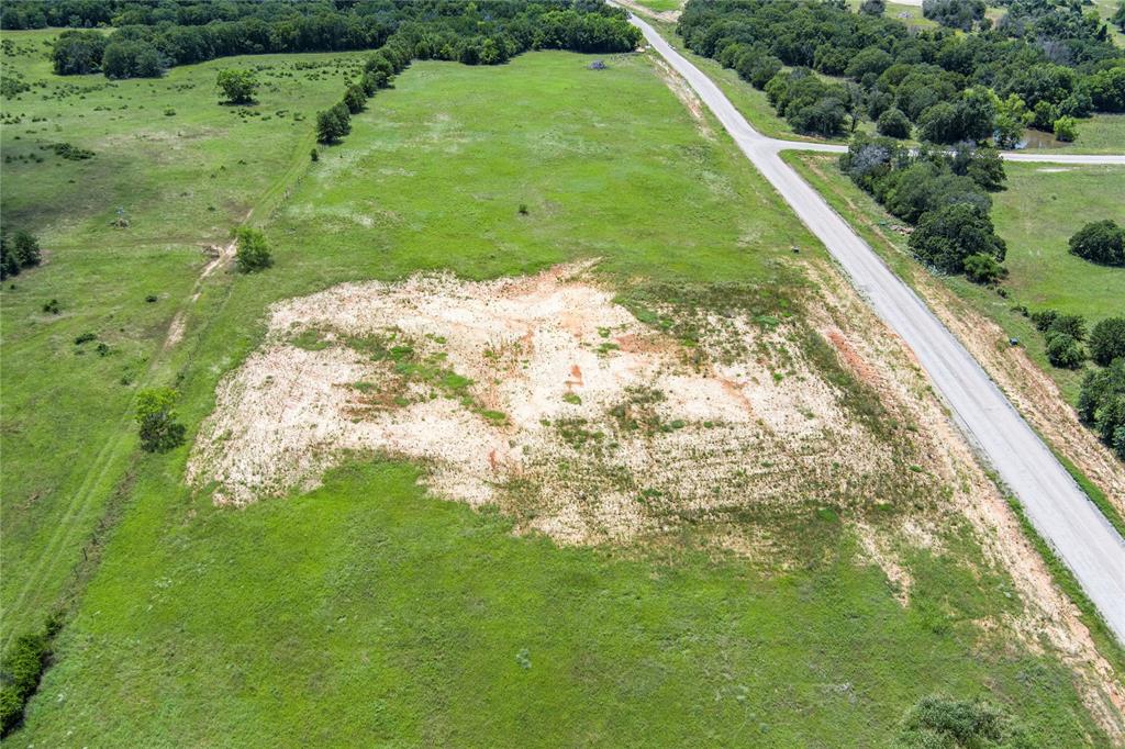 316 Kilkenny Road Poolville, TX 76487 - Photo 10 of 20 a view of a lush green field