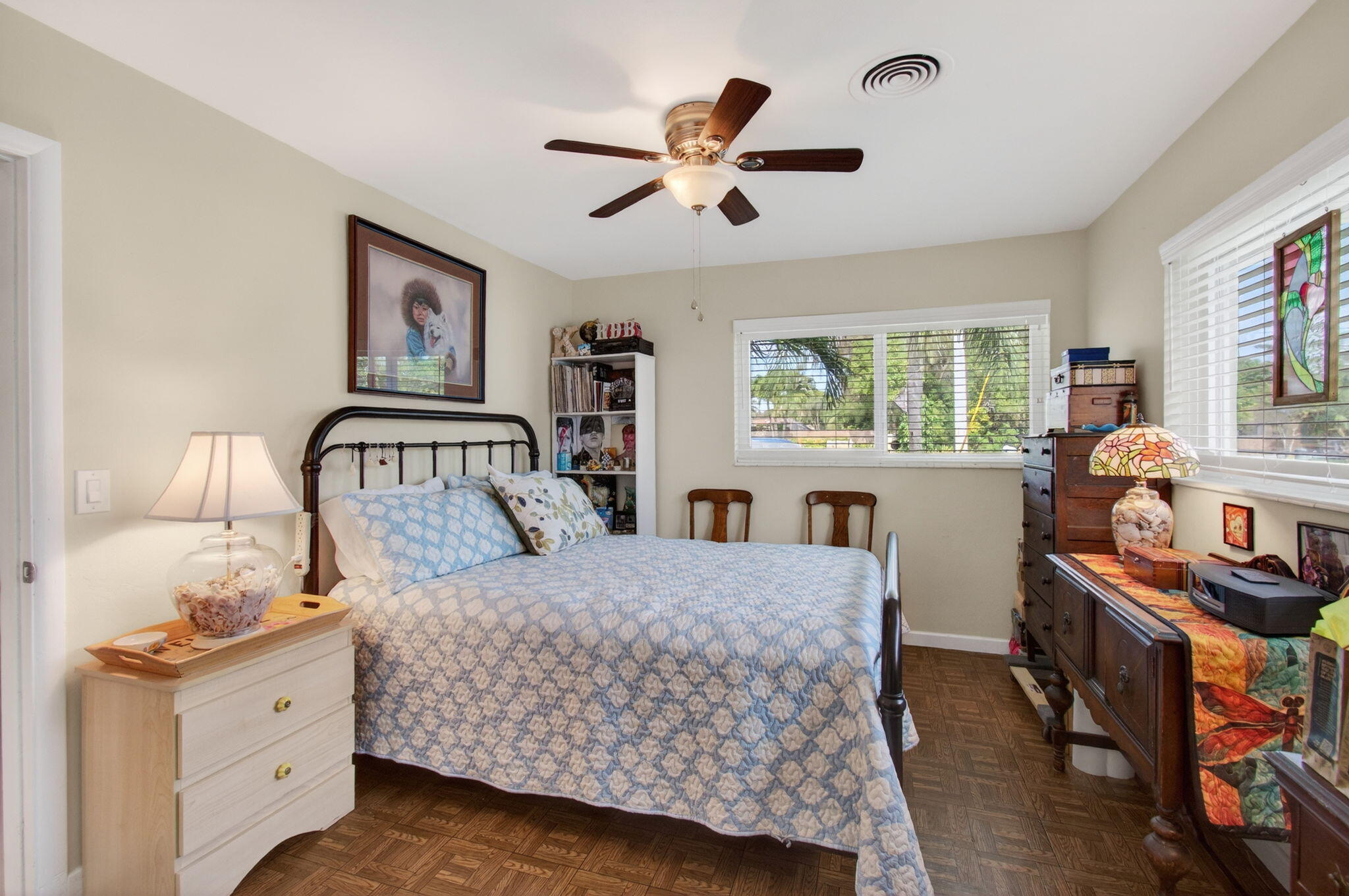 1060 Old Boynton Road Boynton Beach, FL 33426 - Photo 26 of 47 a bedroom with a bed and a dresser next to a window