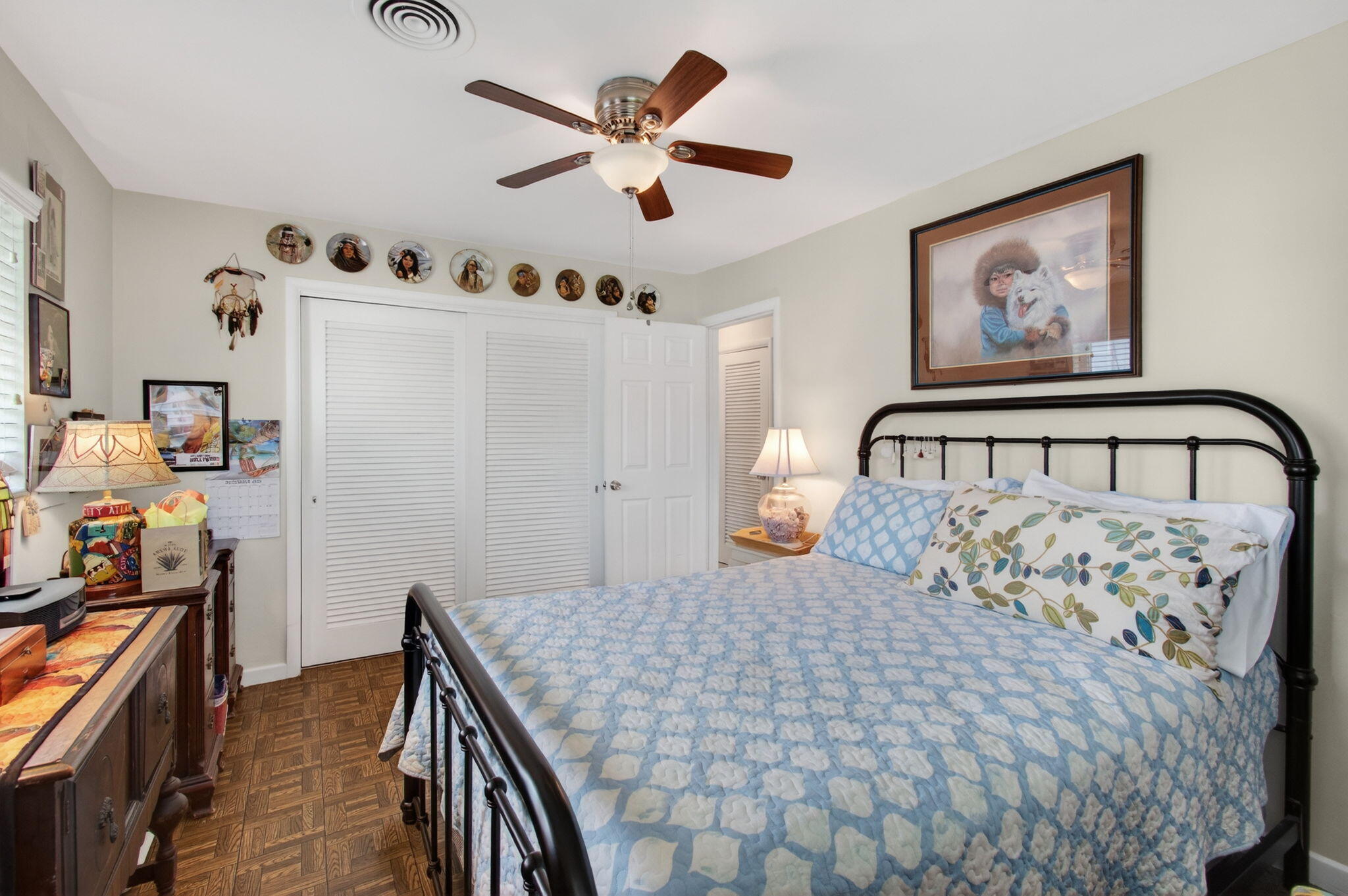 1060 Old Boynton Road Boynton Beach, FL 33426 - Photo 27 of 47 a bedroom with a bed and a chandelier