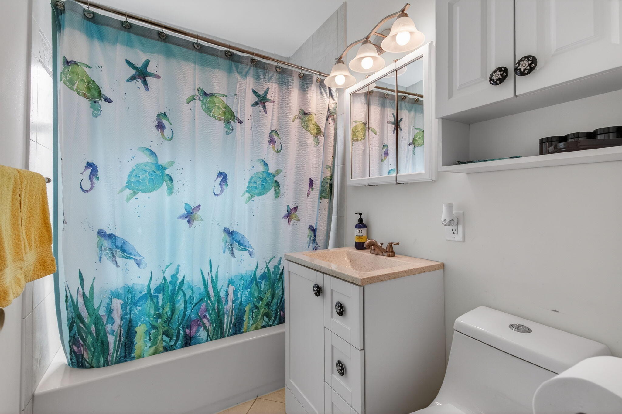 1060 Old Boynton Road Boynton Beach, FL 33426 - Photo 28 of 47 a bathroom with a sink a toilet and a shower curtain