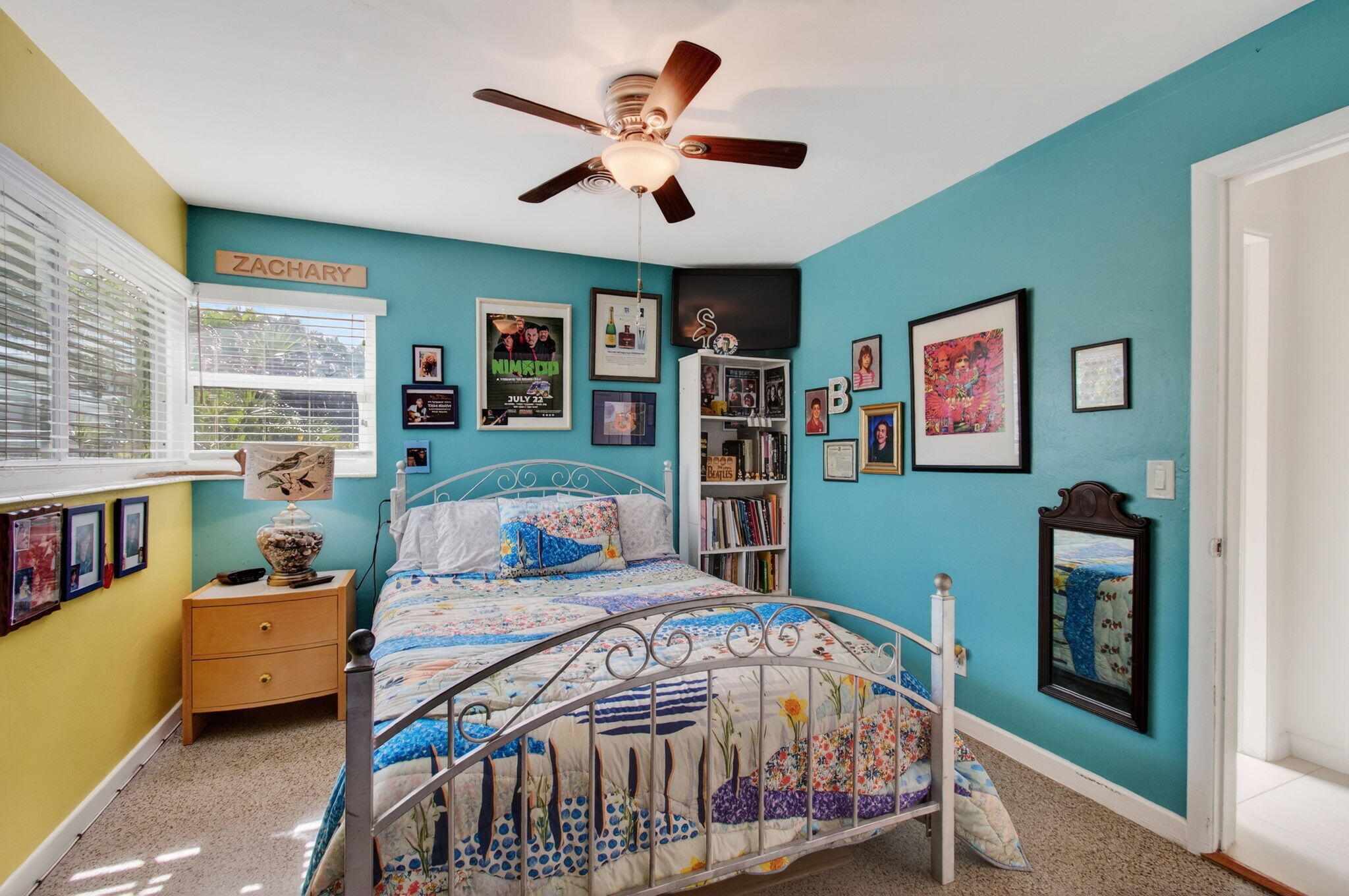 1060 Old Boynton Road Boynton Beach, FL 33426 - Photo 32 of 47 a bedroom with two beds and a chandelier