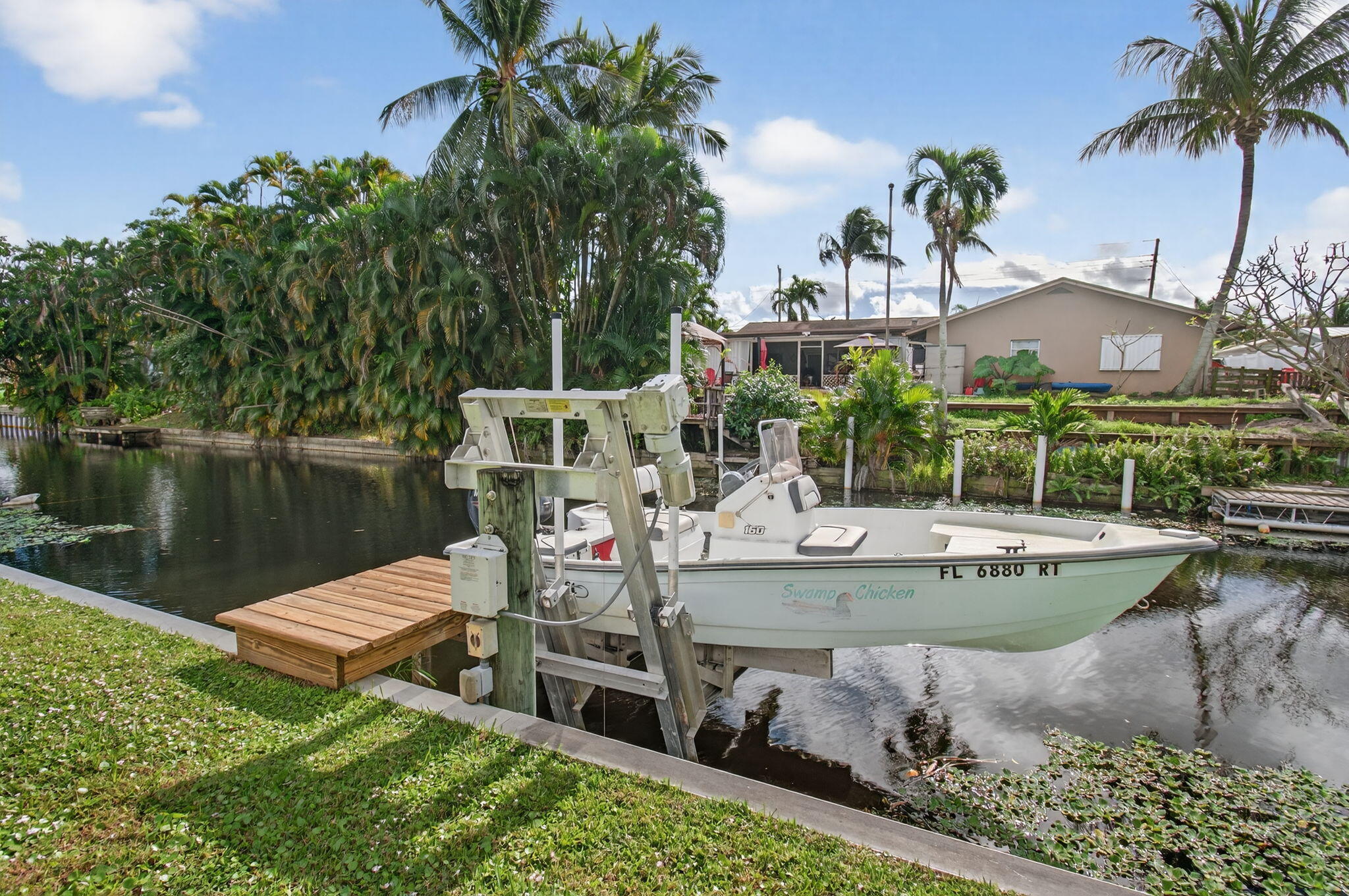 1060 Old Boynton Road Boynton Beach, FL 33426 - Photo 41 of 47 a view of a house with pool and chairs