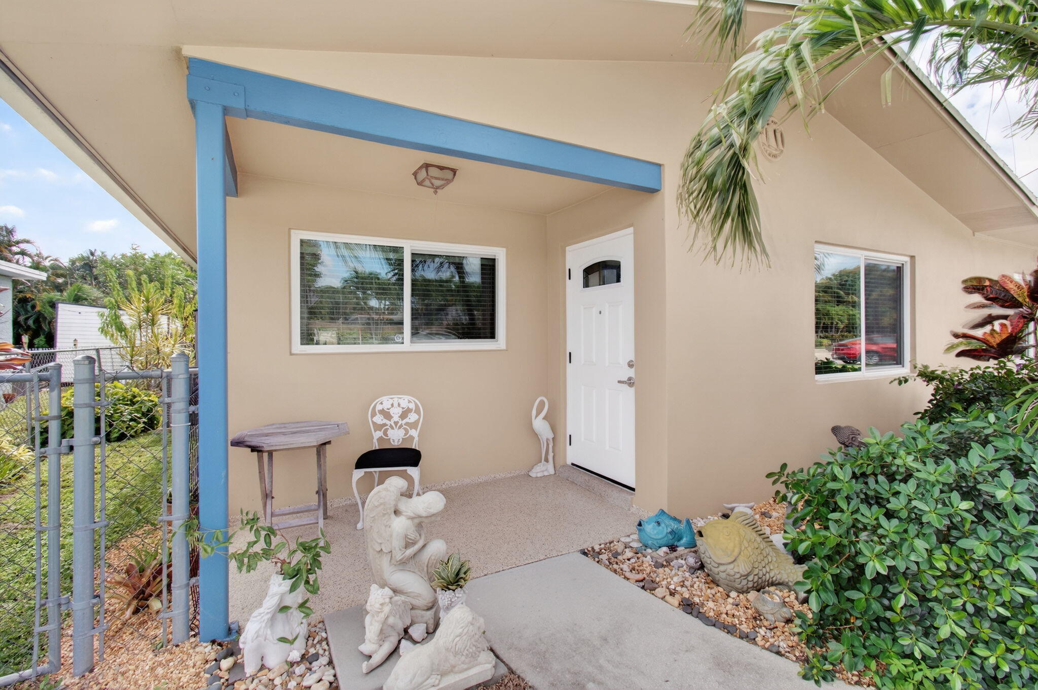 1060 Old Boynton Road Boynton Beach, FL 33426 - Photo 6 of 47 a front view of a house with garden