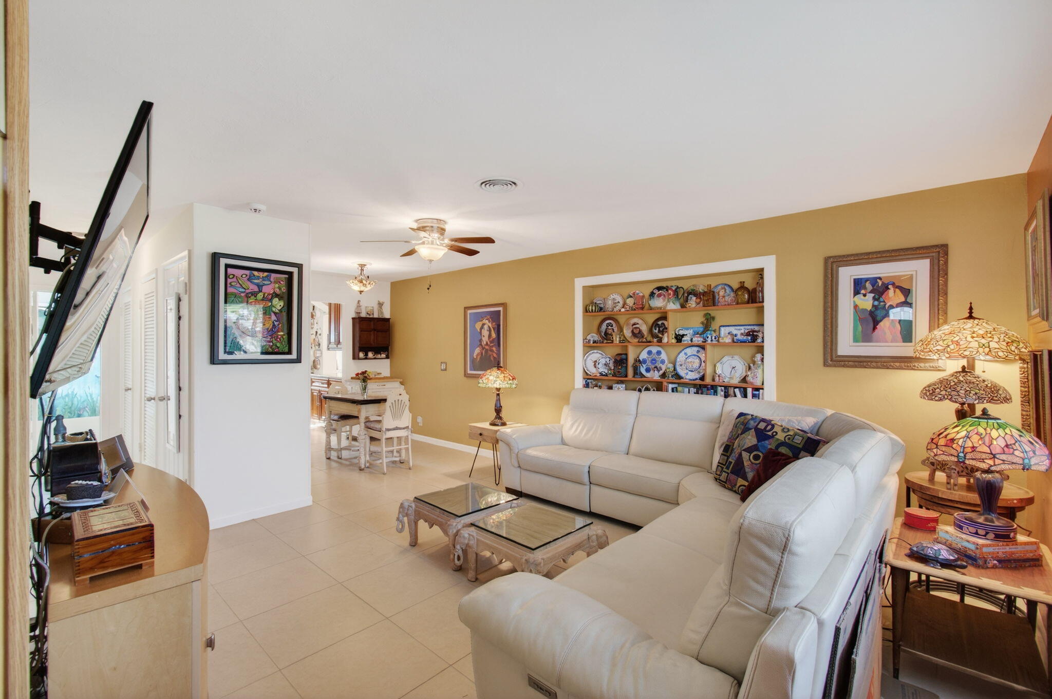 1060 Old Boynton Road Boynton Beach, FL 33426 - Photo 8 of 47 a living room with furniture and a flat screen tv