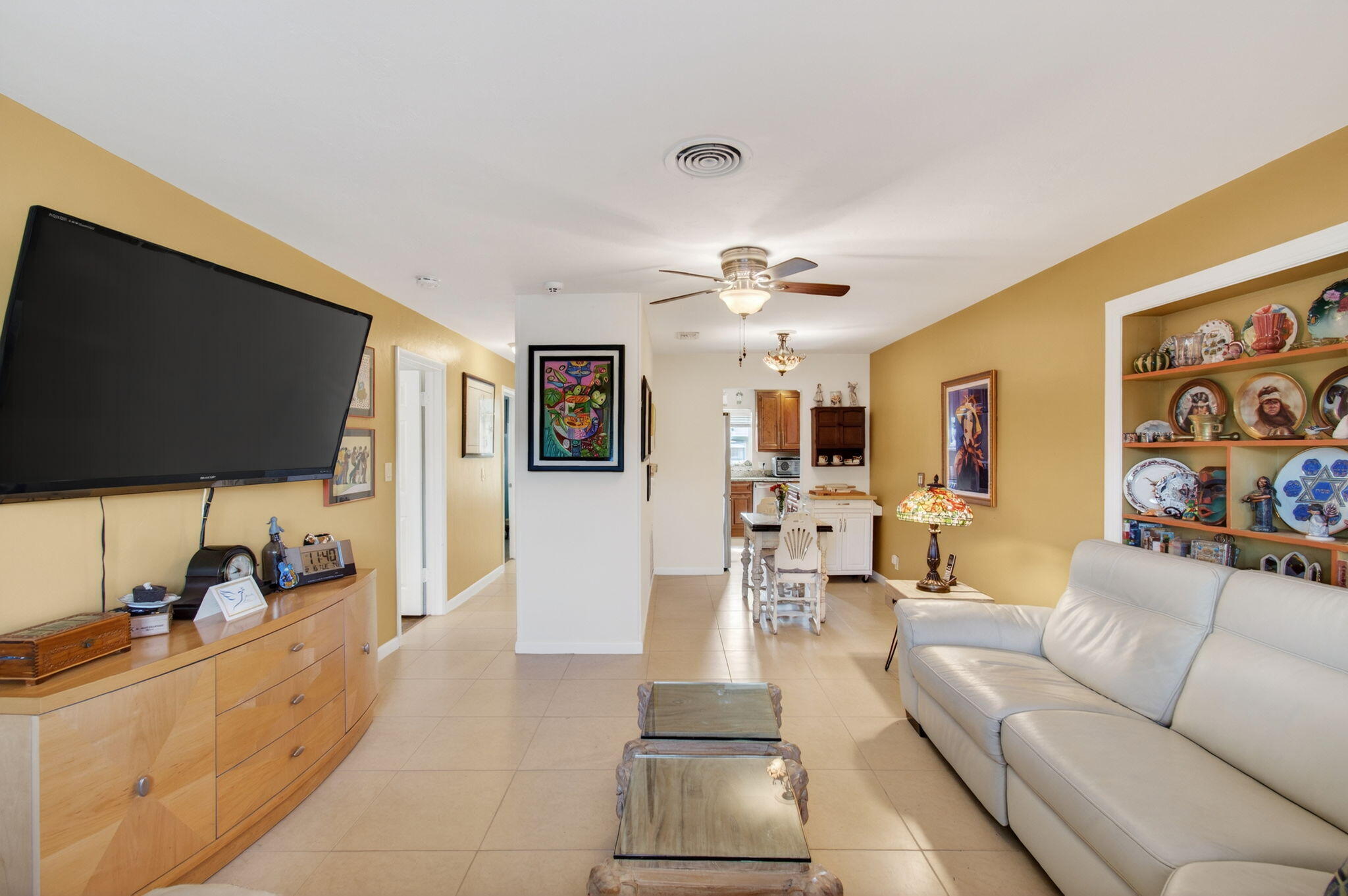 1060 Old Boynton Road Boynton Beach, FL 33426 - Photo 9 of 47 a living room with furniture and a flat screen tv