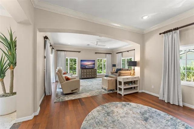 a view of a room with a window and deck