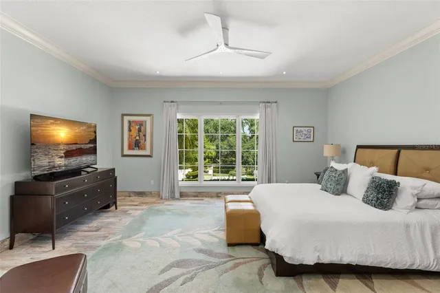 a bathroom with a tub shower sink and mirror