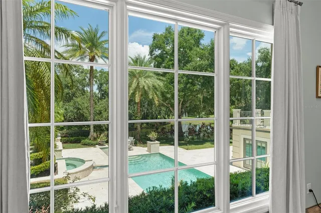 a bath tub sitting next to a window