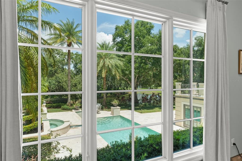 9731 Chestnut Ridge Drive Windermere, FL 34786 - Photo 24 of 57 a view of a room with a window and deck