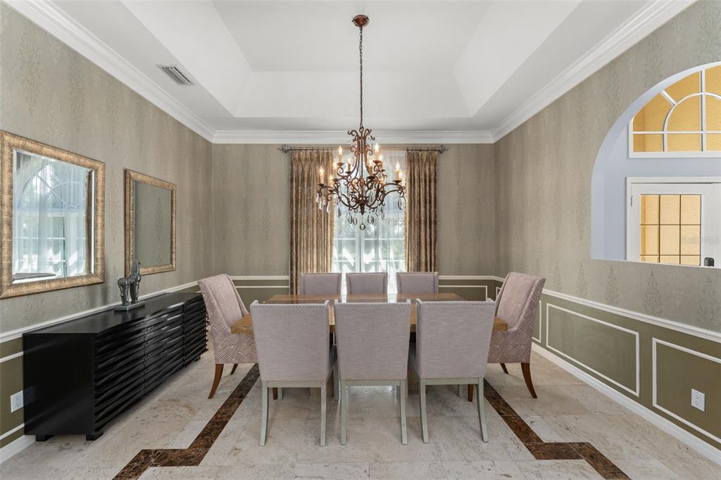 9731 Chestnut Ridge Drive Windermere, FL 34786 - Photo 10 of 57 a view of a dining room with furniture window and outside view
