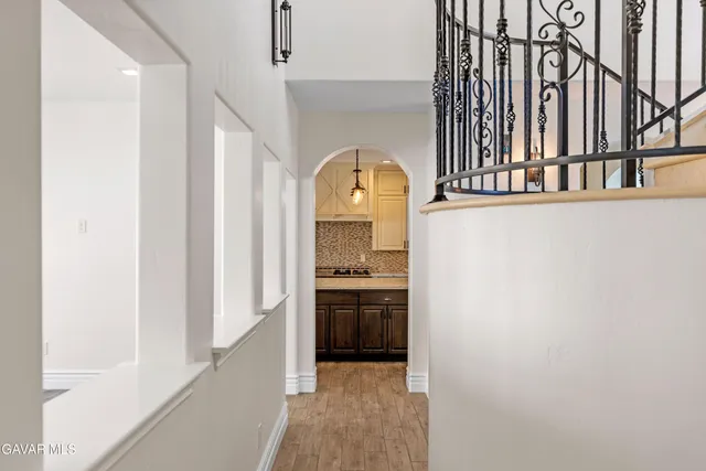 a view of front door with wooden floor