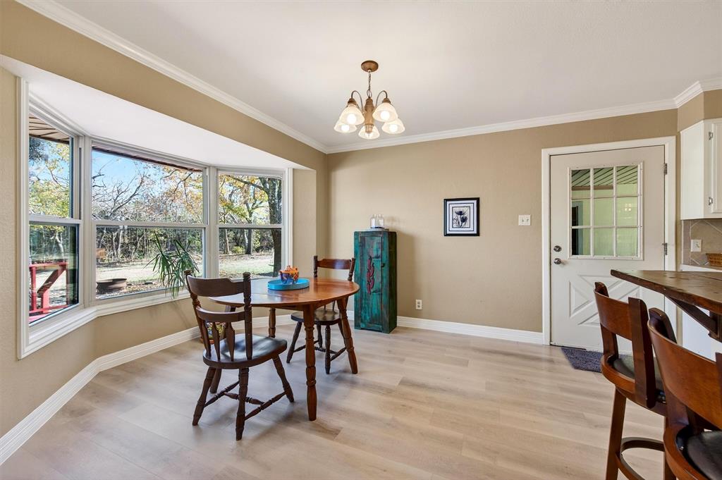 140 Harrell Road Howe, TX 75459 - Photo 13 of 40 a view of a dining room with furniture window and outside view
