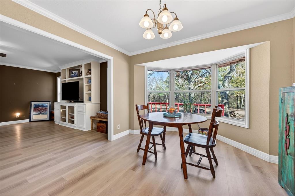 140 Harrell Road Howe, TX 75459 - Photo 14 of 40 a view of a dining room with furniture window and wooden floor