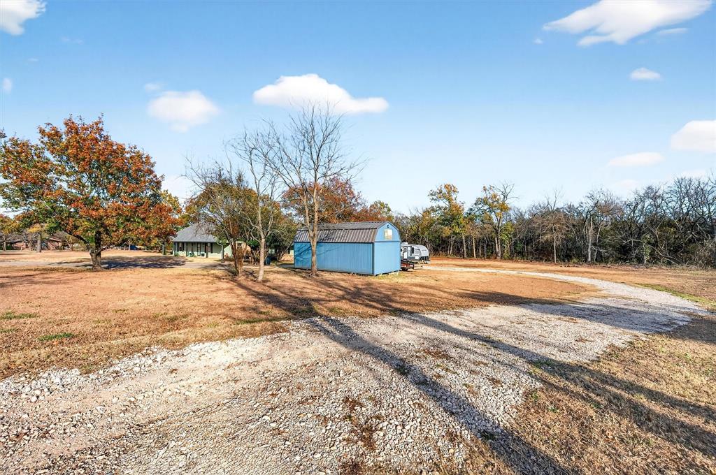 140 Harrell Road Howe, TX 75459 - Photo 32 of 40 a view of a backyard of a house
