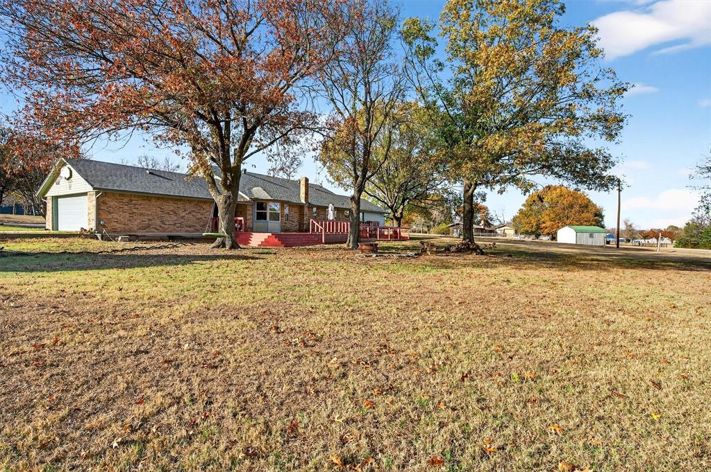 140 Harrell Road Howe, TX 75459 - Photo 34 of 40 a front view of a house with a yard