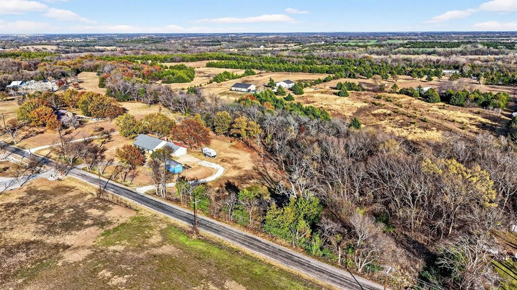 140 Harrell Road Howe, TX 75459 - Photo 39 of 40 an aerial view of residential houses with outdoor space and trees