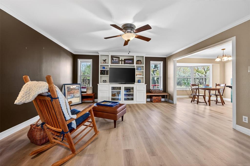 140 Harrell Road Howe, TX 75459 - Photo 7 of 40 a living room with furniture and a flat screen tv