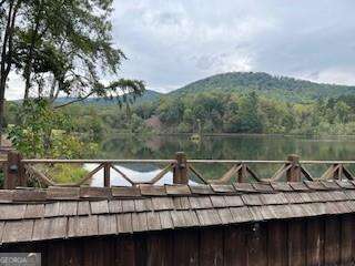 257 Andes Ridge Jasper, GA 30143 - Photo 23 of 24 a view of a wooden deck and lake