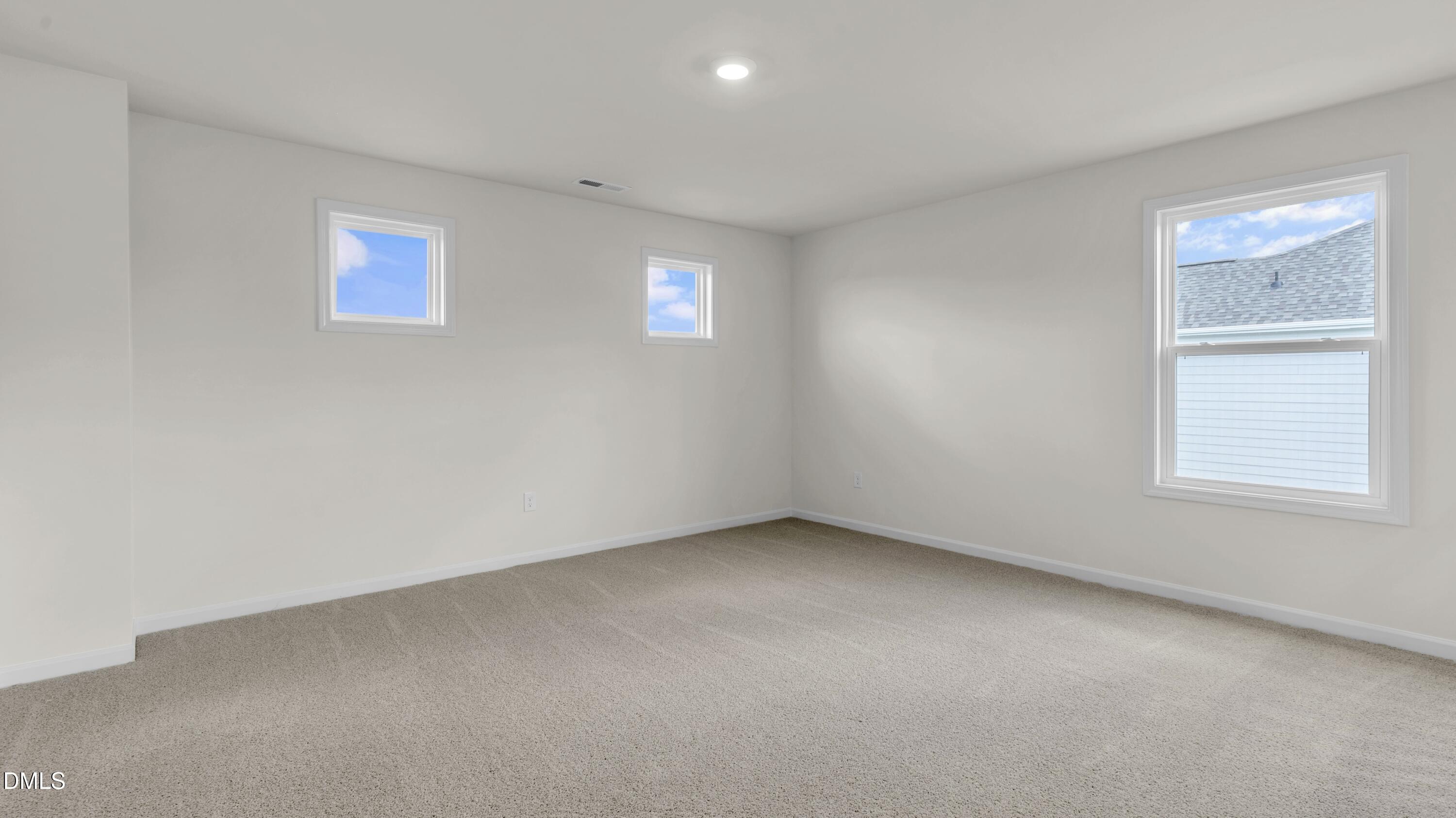 191 Gilmer Street Fuquay-Varina, NC 27526 - Photo 16 of 40 a view of an empty room with a window