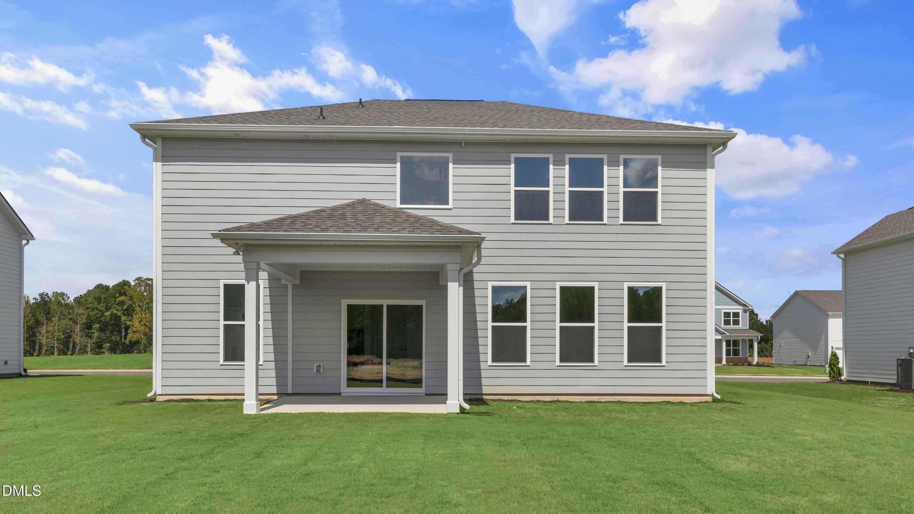 191 Gilmer Street Fuquay-Varina, NC 27526 - Photo 36 of 40 a front view of a house with a yard
