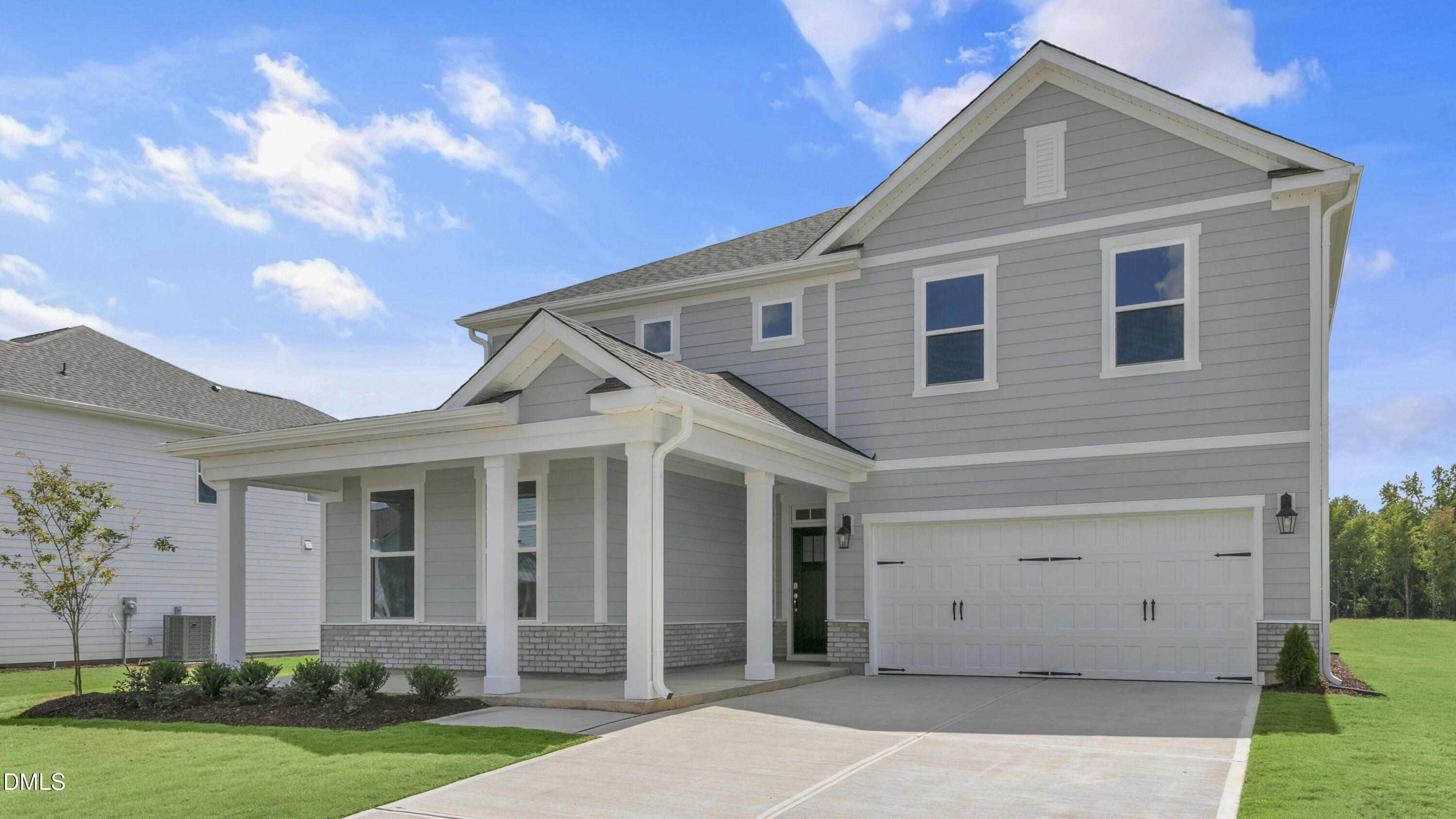 191 Gilmer Street Fuquay-Varina, NC 27526 - Photo 4 of 40 front view of a house with a yard
