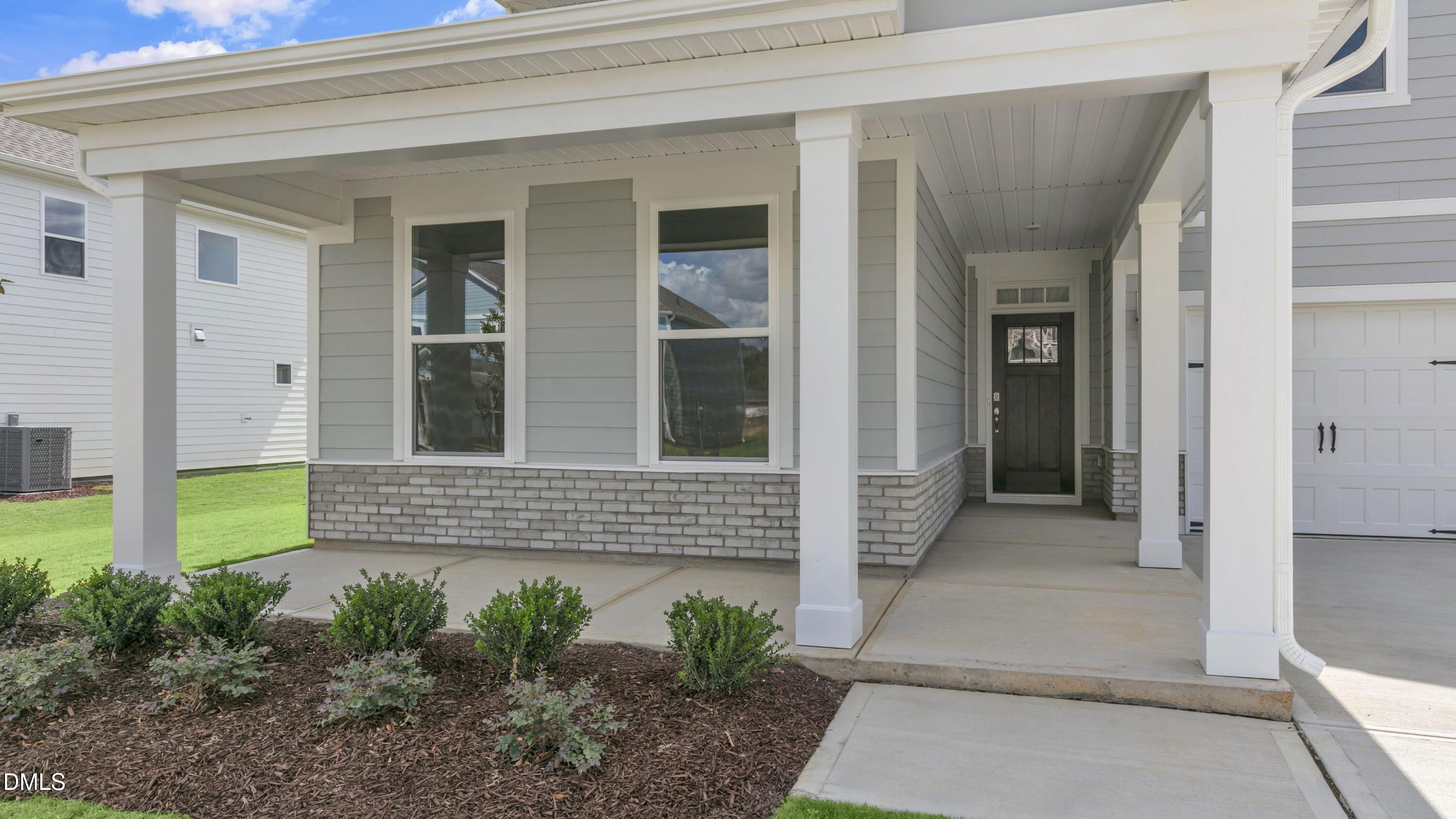 191 Gilmer Street Fuquay-Varina, NC 27526 - Photo 5 of 40 a view of house with backyard