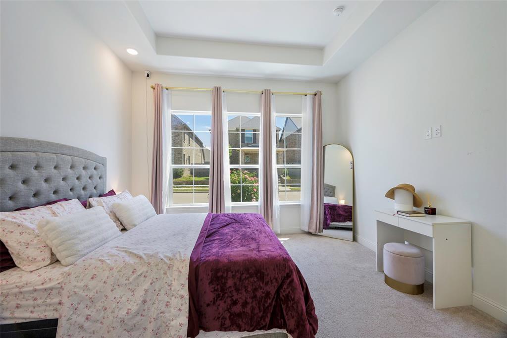 3603 Scotsman Road Sachse, TX 75048 - Photo 14 of 33 a bedroom with bed and window