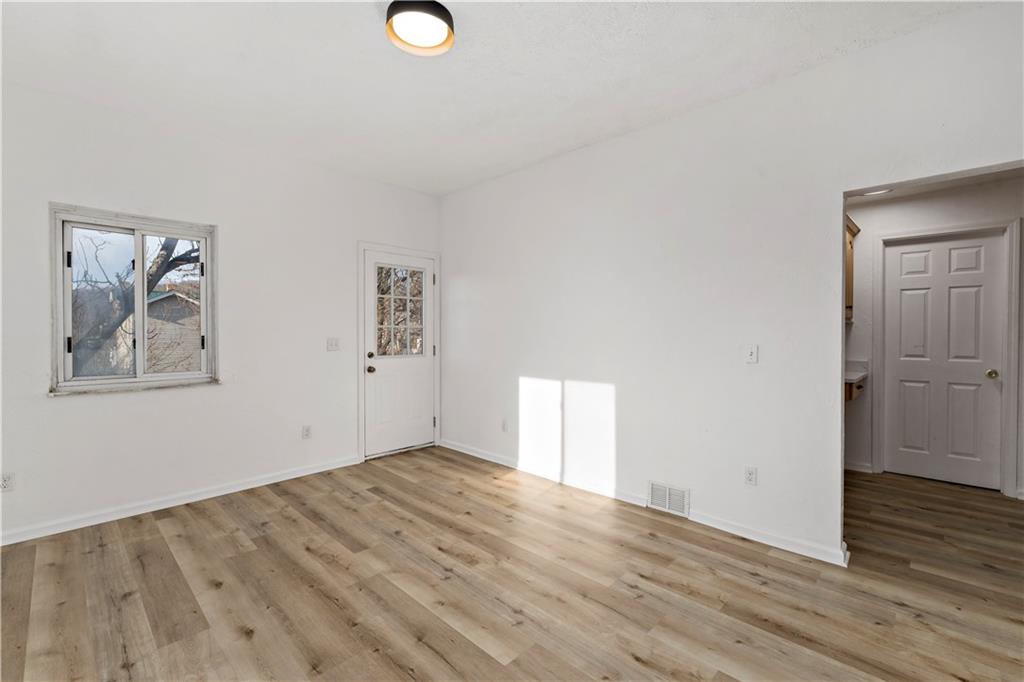 58 Locust Street McKees Rocks, PA 15136 - Photo 11 of 37 a view of empty room with wooden floor