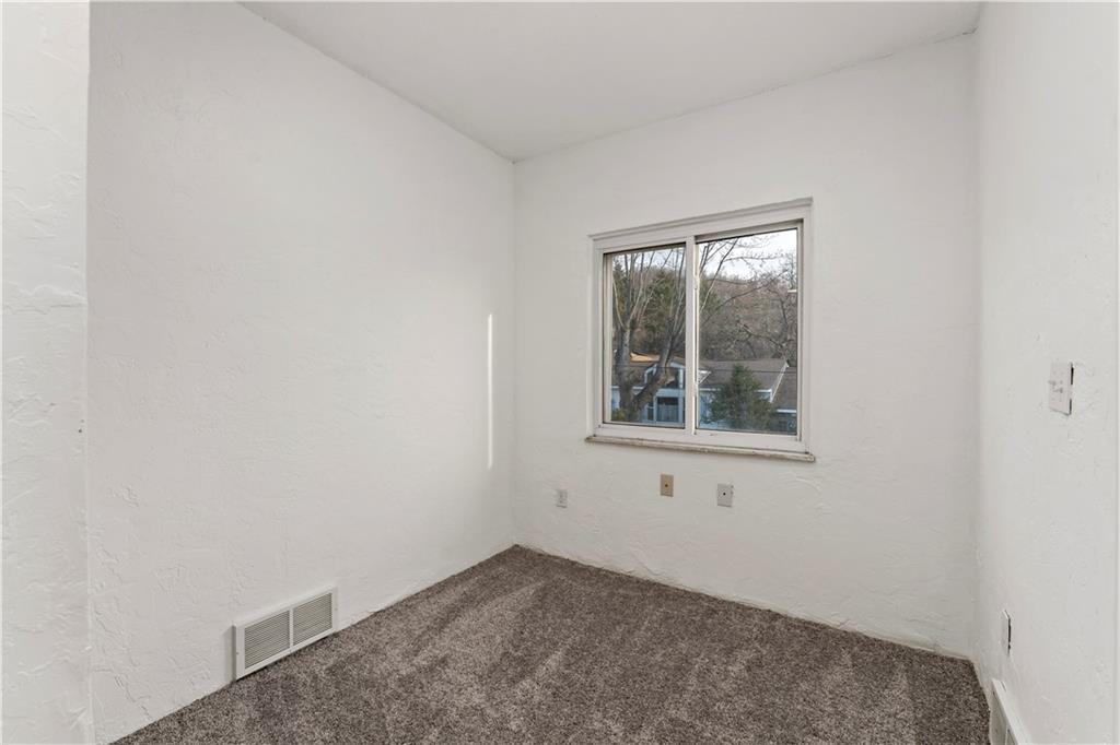 58 Locust Street McKees Rocks, PA 15136 - Photo 18 of 37 an empty room with a window