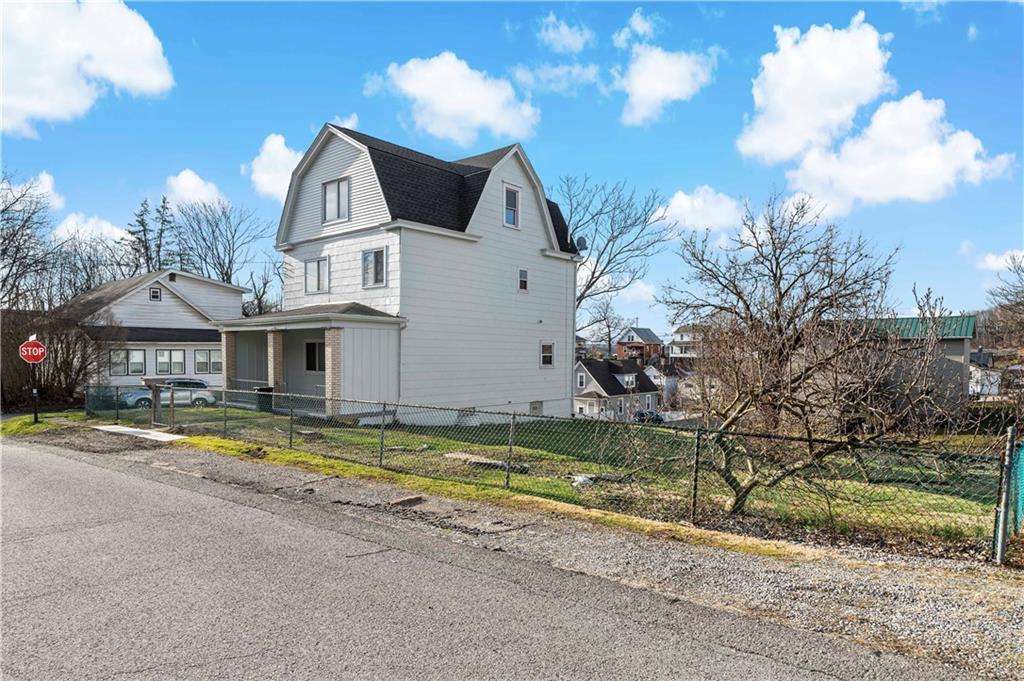 58 Locust Street McKees Rocks, PA 15136 - Photo 2 of 37 a view of a house with a yard