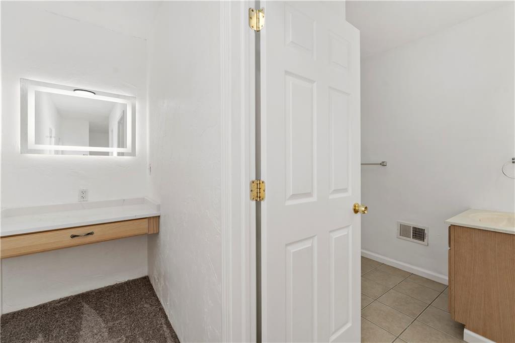 58 Locust Street McKees Rocks, PA 15136 - Photo 24 of 37 a room with storage and utility