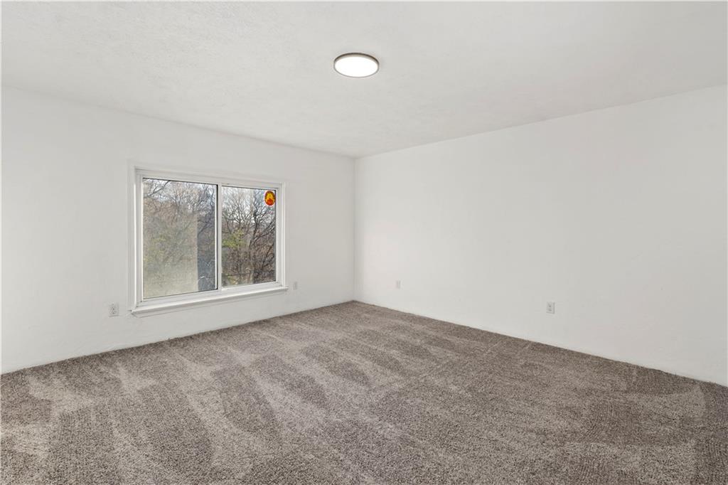 58 Locust Street McKees Rocks, PA 15136 - Photo 29 of 37 a view of an empty room with a window