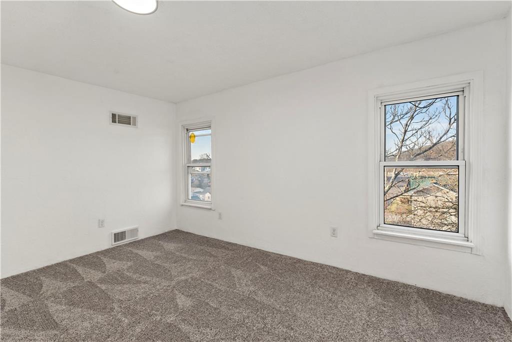 58 Locust Street McKees Rocks, PA 15136 - Photo 31 of 37 an empty room with windows