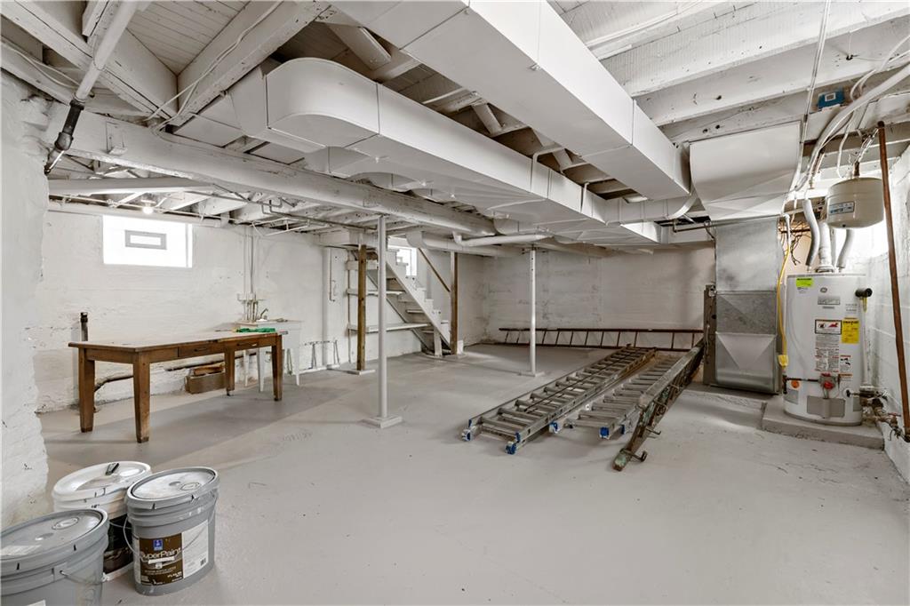 58 Locust Street McKees Rocks, PA 15136 - Photo 34 of 37 a view of a room with gym equipment
