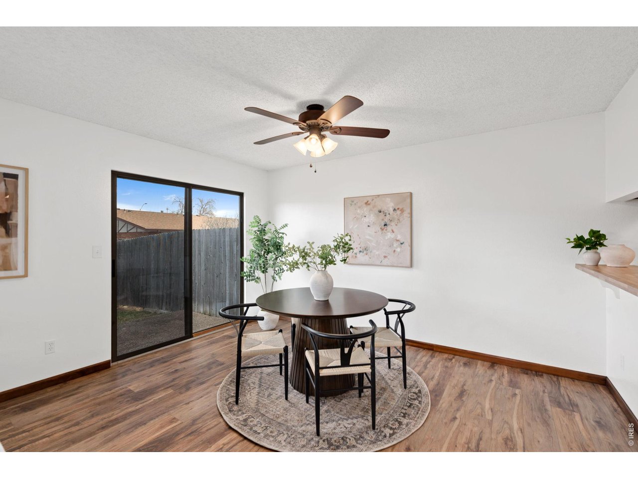 1900 Real Court, Unit A Fort Collins, CO 80526 - Photo 11 of 39 a workspace with furniture and wooden floor