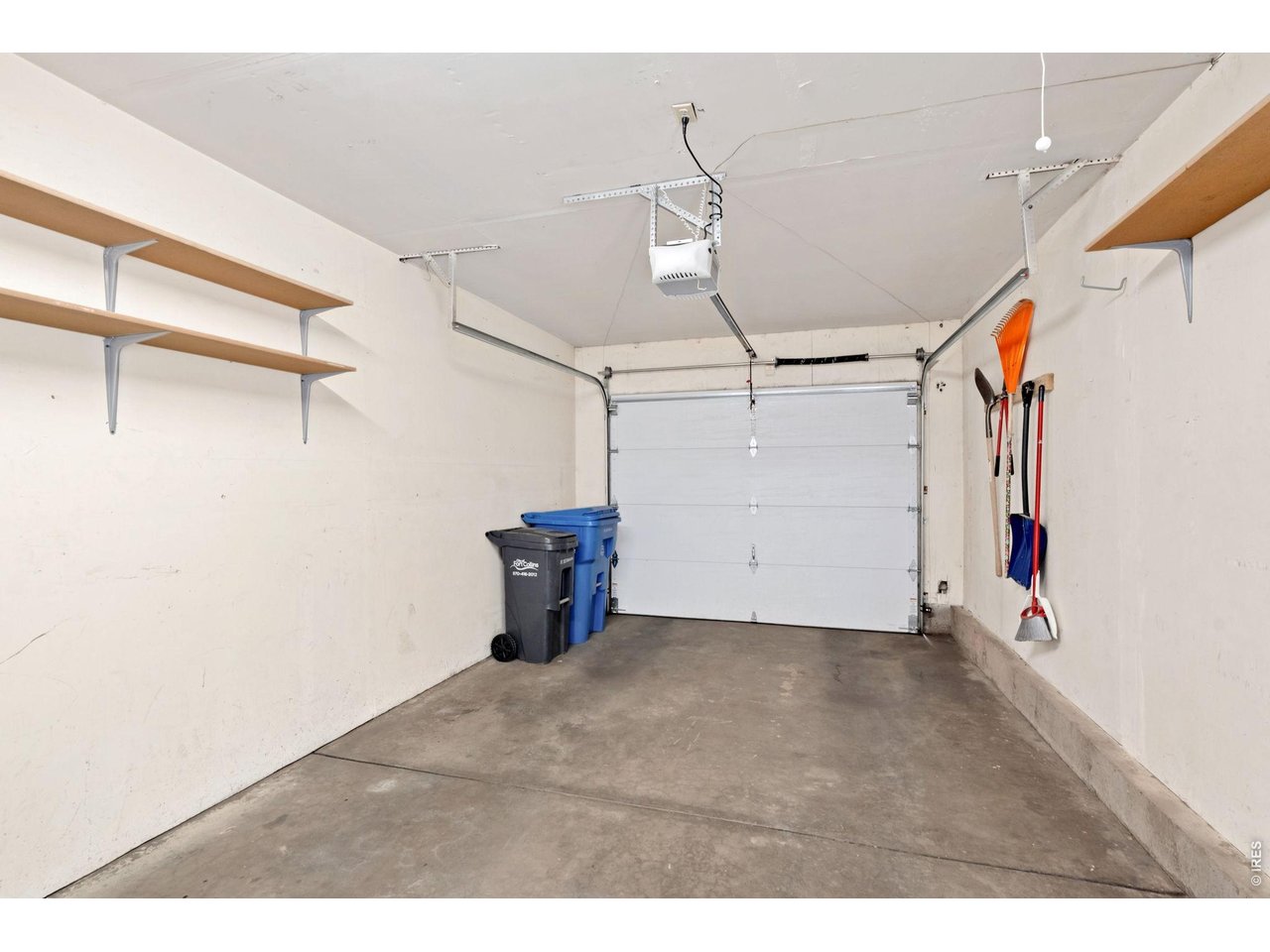 1900 Real Court, Unit A Fort Collins, CO 80526 - Photo 23 of 39 a view of a garage with an empty space
