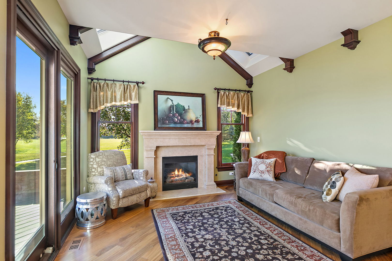 3660 Broadleaf Avenue Elgin, IL 60124 - Photo 23 of 84 a living room with furniture and a fireplace