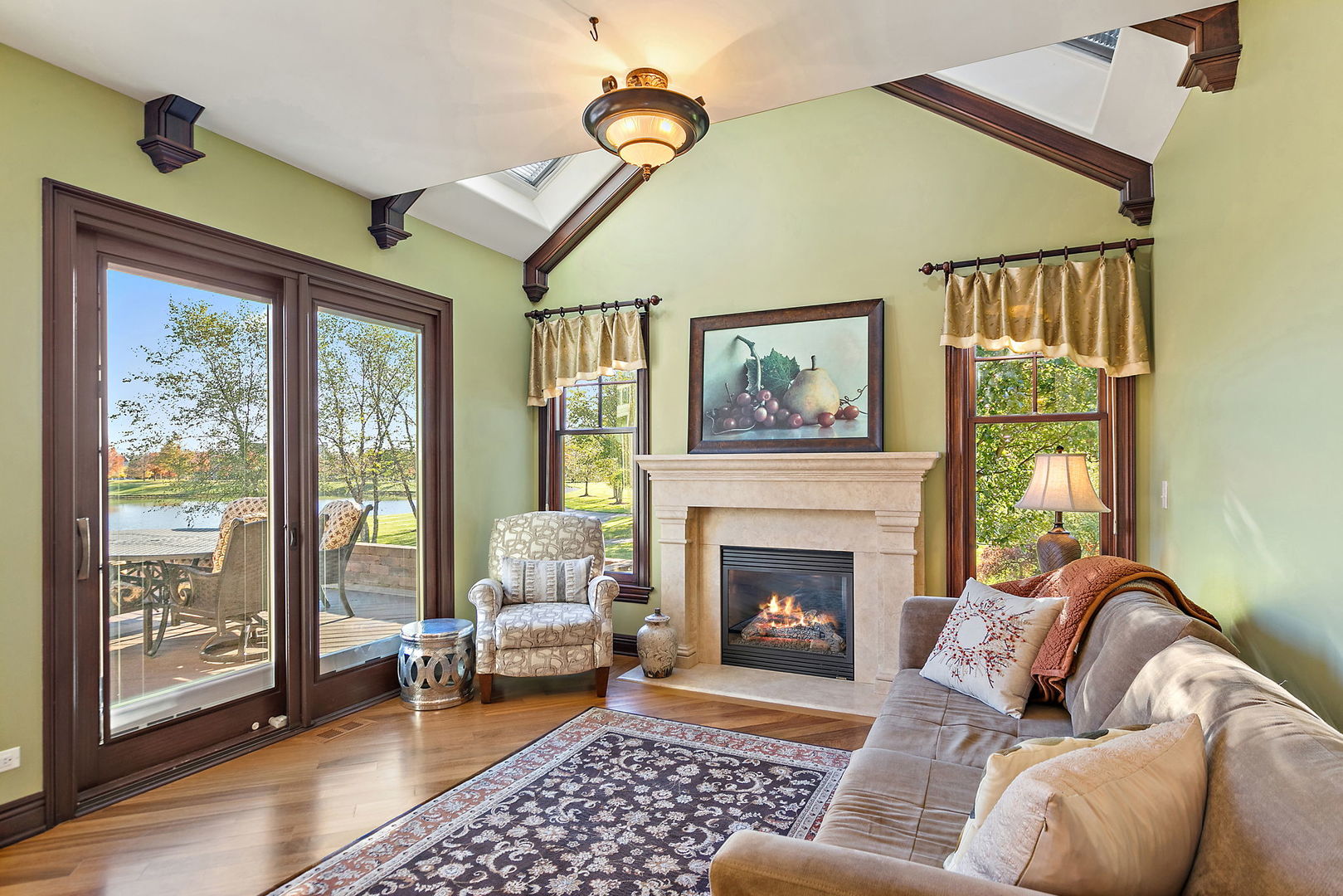 3660 Broadleaf Avenue Elgin, IL 60124 - Photo 24 of 84 a living room with furniture and a fireplace