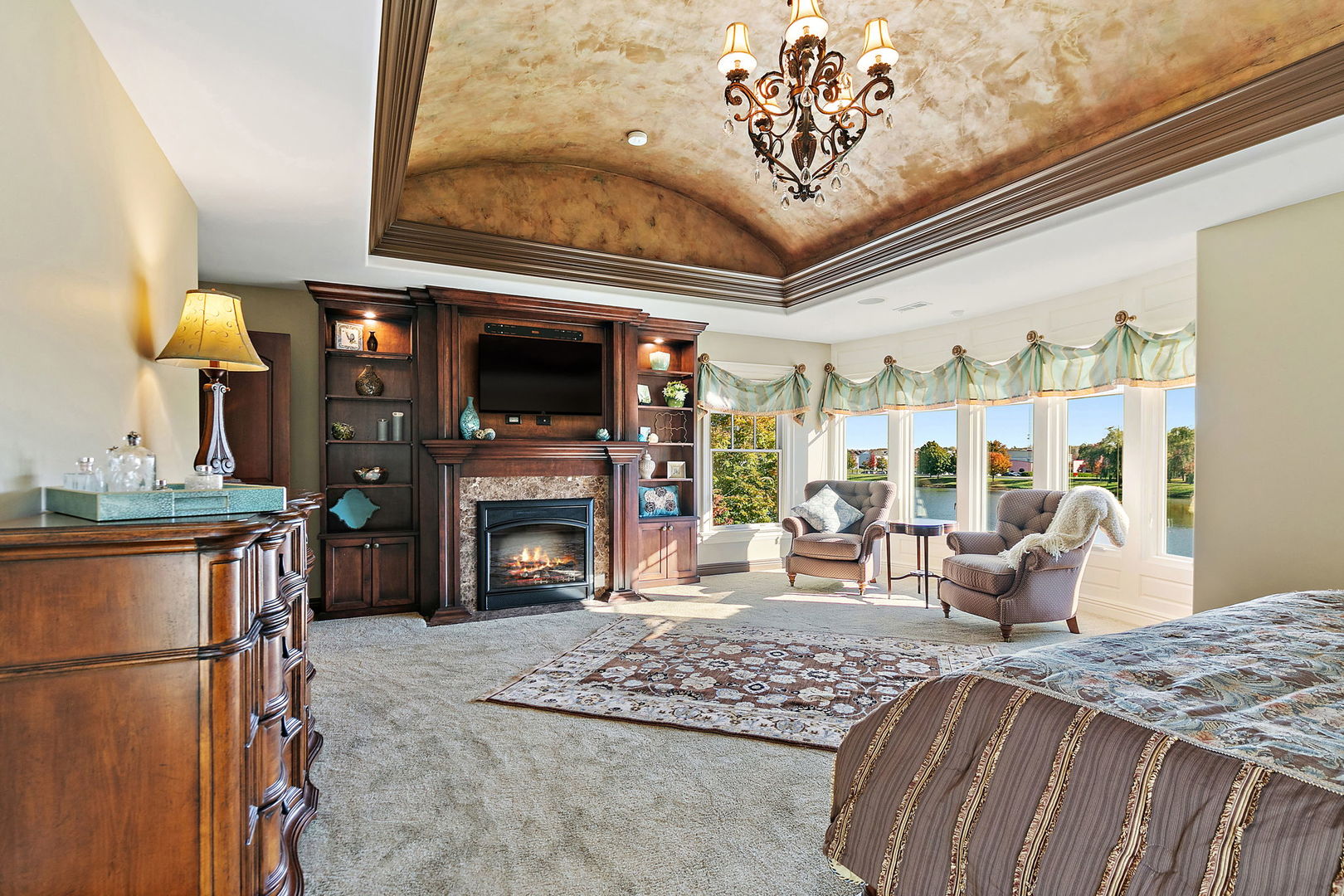 3660 Broadleaf Avenue Elgin, IL 60124 - Photo 38 of 84 a bed room with furniture and a fireplace